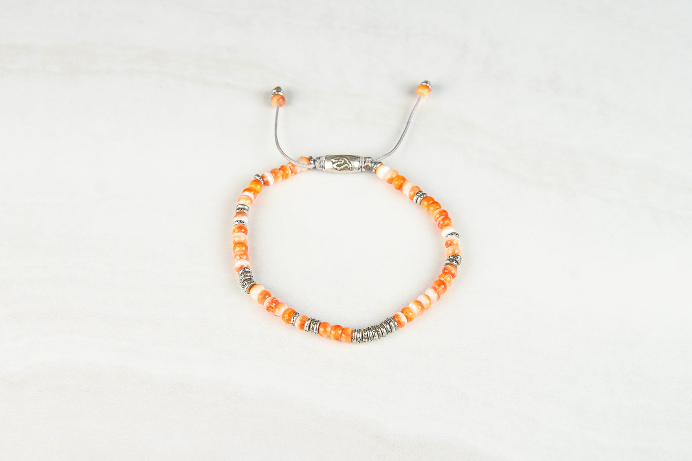 Orange spiny shell -sliver lining bracelet.