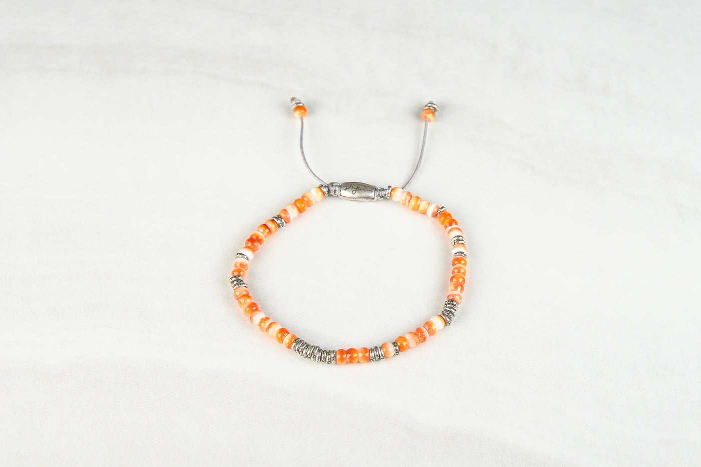 Orange spiny shell -sliver lining bracelet.