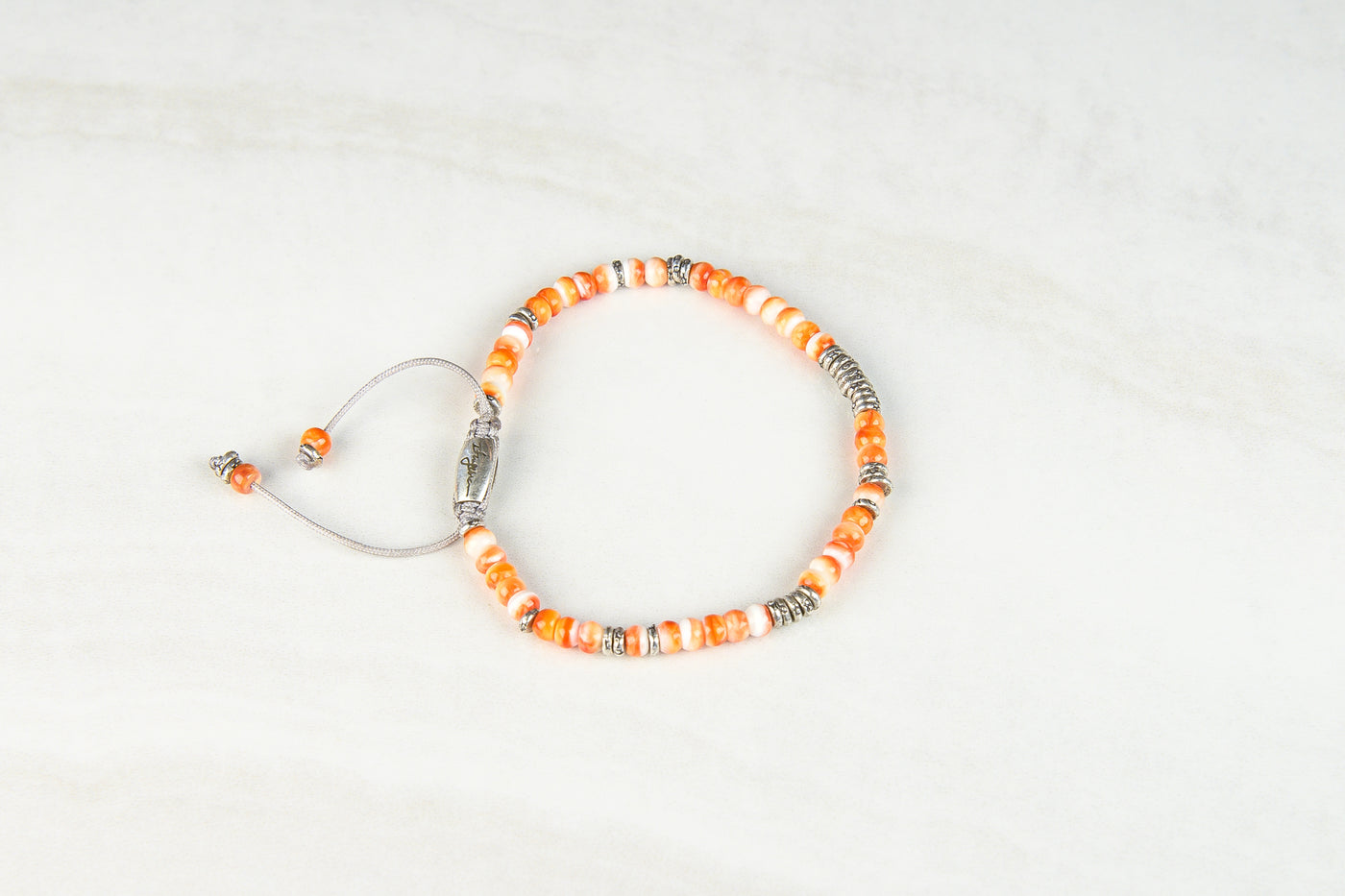 Orange spiny shell -sliver lining bracelet.